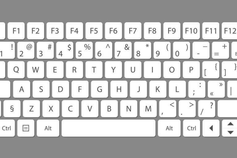 Um teclado de computador com as teclas brancas